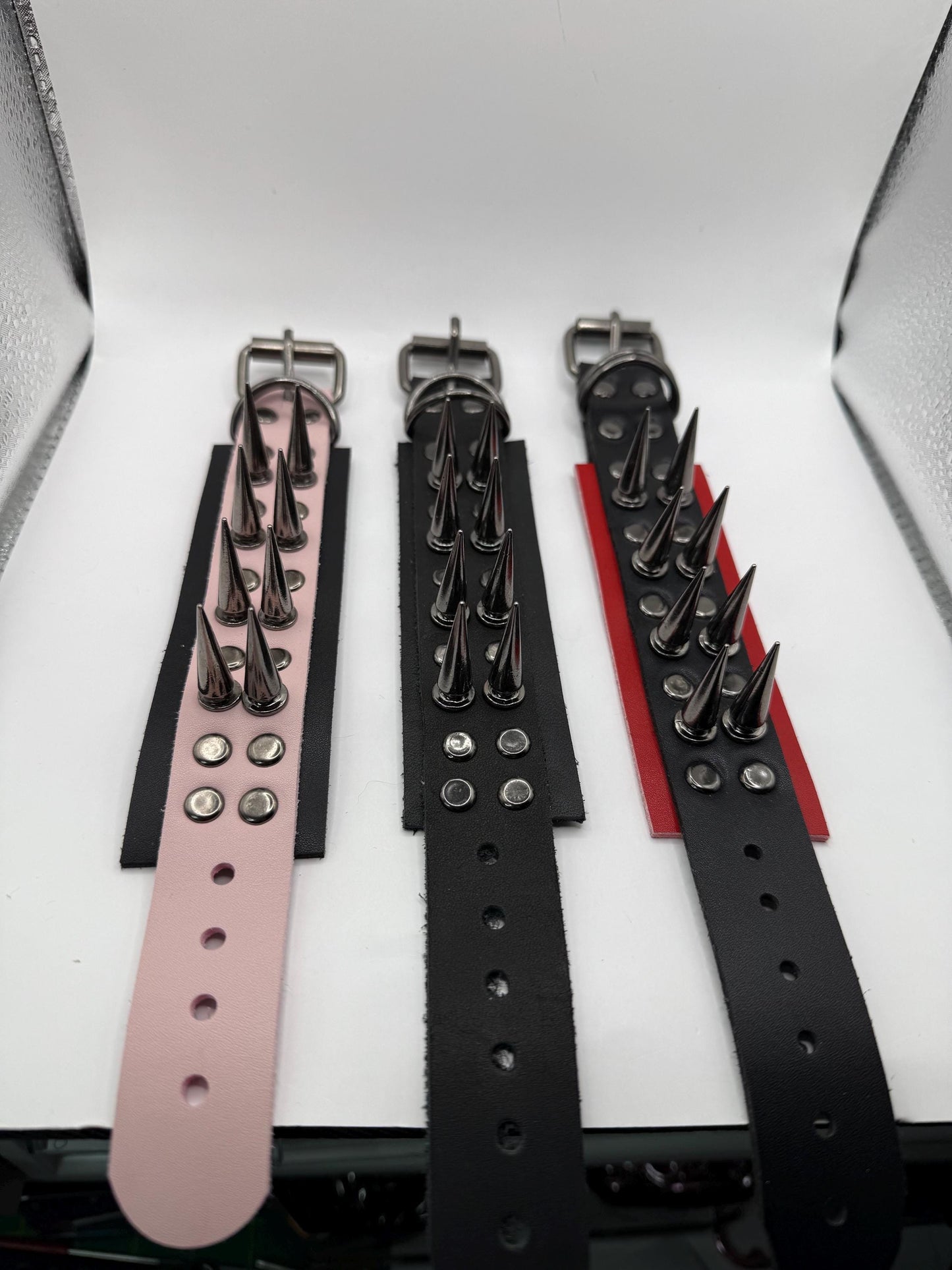 Red // Gunmetal Spiked Bracelets